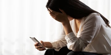 woman-sad-phone