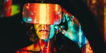 Woman wearing AR glasses in the dark