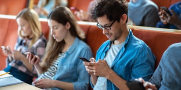 student with phone