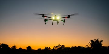 Drone flying sunset