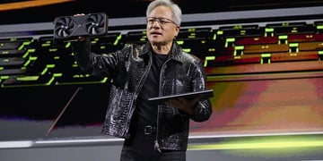 Jensen Huang holding GeForce RTX 50 at CES 2025