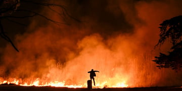 la-wildfires-man-jumping