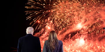 Donald Trump and Melania Trump watching fireworks