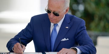 Joe Biden signing a document.