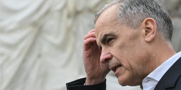 Mark Carney scratching his head.