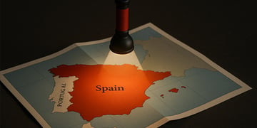 Map of Spain and Portugal under the hanging light; power blackout in the Iberian Peninsula