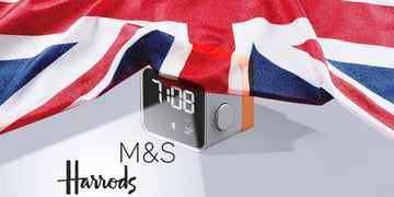 UK flag with alarm clock, M&S and Harrods logos
