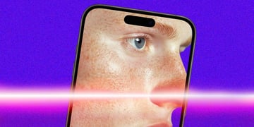 A face of a person on a mobile phone; facial recognition; biometrics