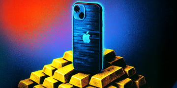 iphone on top an a load of gold bricks, red and blue background