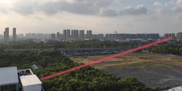 red laser beam over a field
