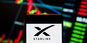 The Starlink logo on a colorful dashboard.