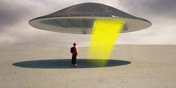Someone standing next to a UFO.