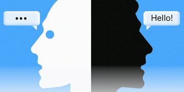 profiles of a black and white head, one having the typing image, other saying hello