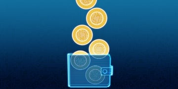 blue transparent crypto wallet with gold coins falling to it