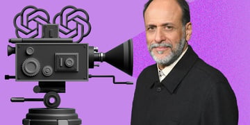Guadagnino in front of the camera with a pink background