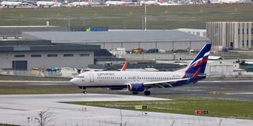 aeroflot plane, aiport, other fleets in baground, russian flag