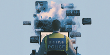 white man's back, British police reflective jacket, pictures of riots