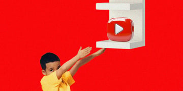 youtube logo on white shelf, black kid, black hair, yellow shirt, hands up
