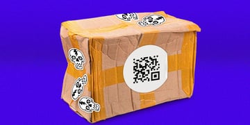 cardboard box with white broken animated sculls, qr code