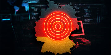 map of germany, black, red and yellow flag, red target, blue computer screen