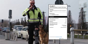 man in yellow jacket walks a German sheppard,