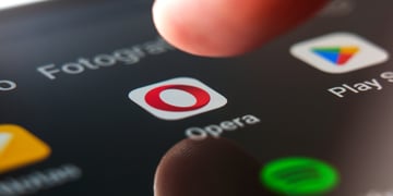 opera browser, o letter in red, finger tip, black screen