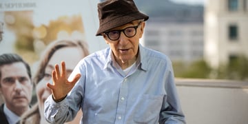 American director Woody Allen waving at camera