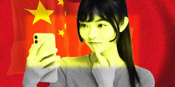 An influencer looking at her phone with Chinese flag on the background