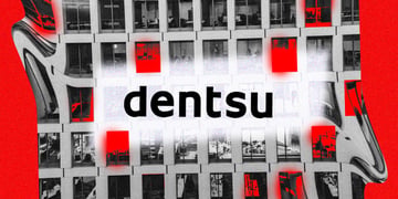 Dentsu logo with an office building