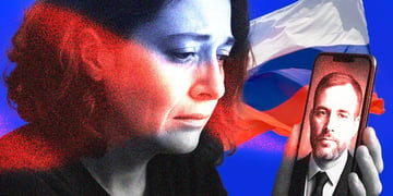 A Russian widow gazing at her deceased soldier husband, with the Russian flag in the background.