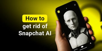 A hand holding a smartphone with a robot on screen