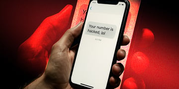white hand holds smartphone, sms message, red hand shadow,