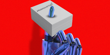 A robot's hand holding a manuscript