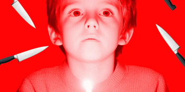 A child surrounded by knives