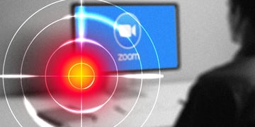 red and white target, blue screen, zoom logo on it, man in black and white
