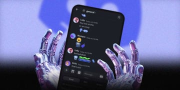 A pair of robot hands holding a blurred out chat on Discord, on a phone.