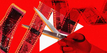 A hand hold holding scissors cutting film roll, Youtube's logo