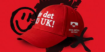 A red hat that says "Make America Go Away" in the Inuit language