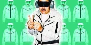 General Maduro in a grey Nike tracksuit and sleeping mask, doing the peace sign.