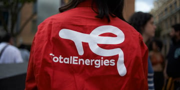 TotalEnergies logo on a persons back