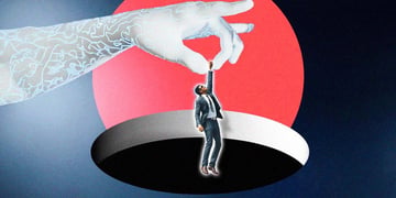 A robot's hand holding a person dressed as an office worker who is about to fall