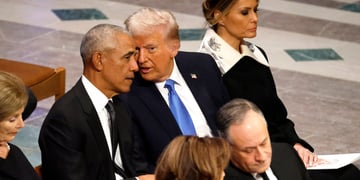 President Barack Obama talking to President Donald Trump