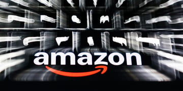 laptop keyboard, Amazon logo, phone screen, multiple exposure illustration, orange arrow