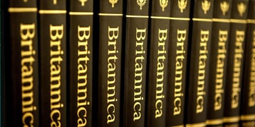 britannica ecyclopedia dark brownbooks, golden, yellow letters, on shelve