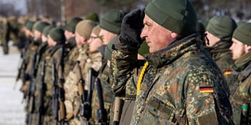 german army, winter, in line, germany flag, green uniform, red cheeks,