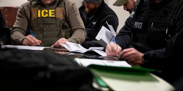 ICE agents during raid
