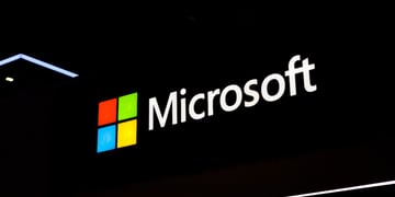 The Microsoft corporate logo is illuminated at the Fira Gran Vi