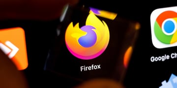 mozilla firfox logo on black screen next to google chrome logo