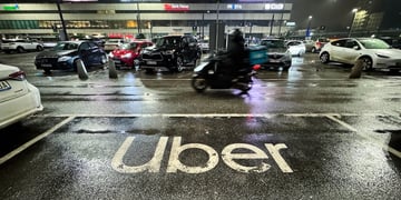 uber sign road motorcycle
