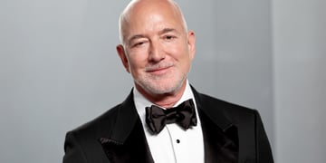 jeff bezos, grey short beard, bald scalp, black tuxedo, white shirt, black bow tie
